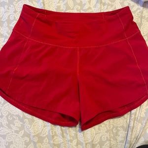 Red Lululemon shorts